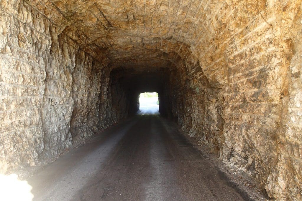 Internal view of a rock tunnel on Iron Mountain Road